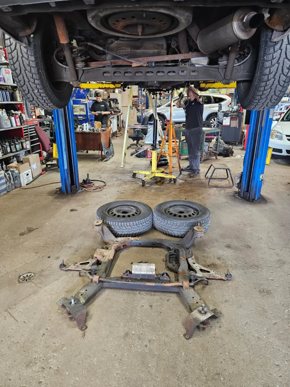 Suspension and undercarriage work on vehicle lift