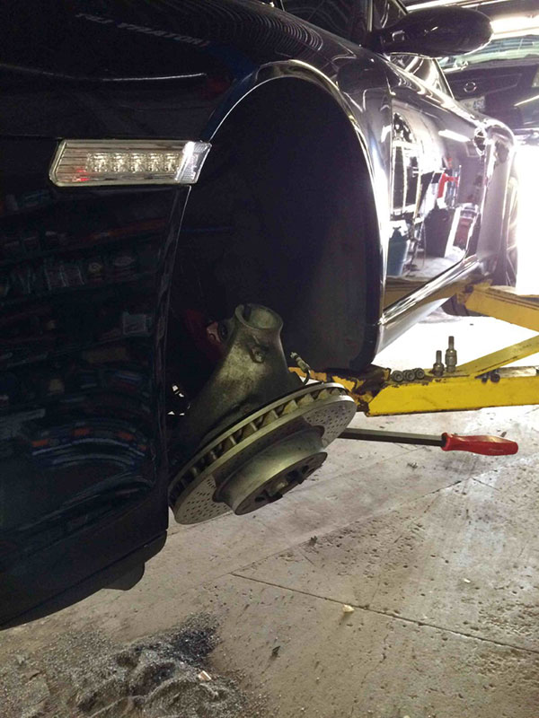 Brake rotor service on vehicle lift
